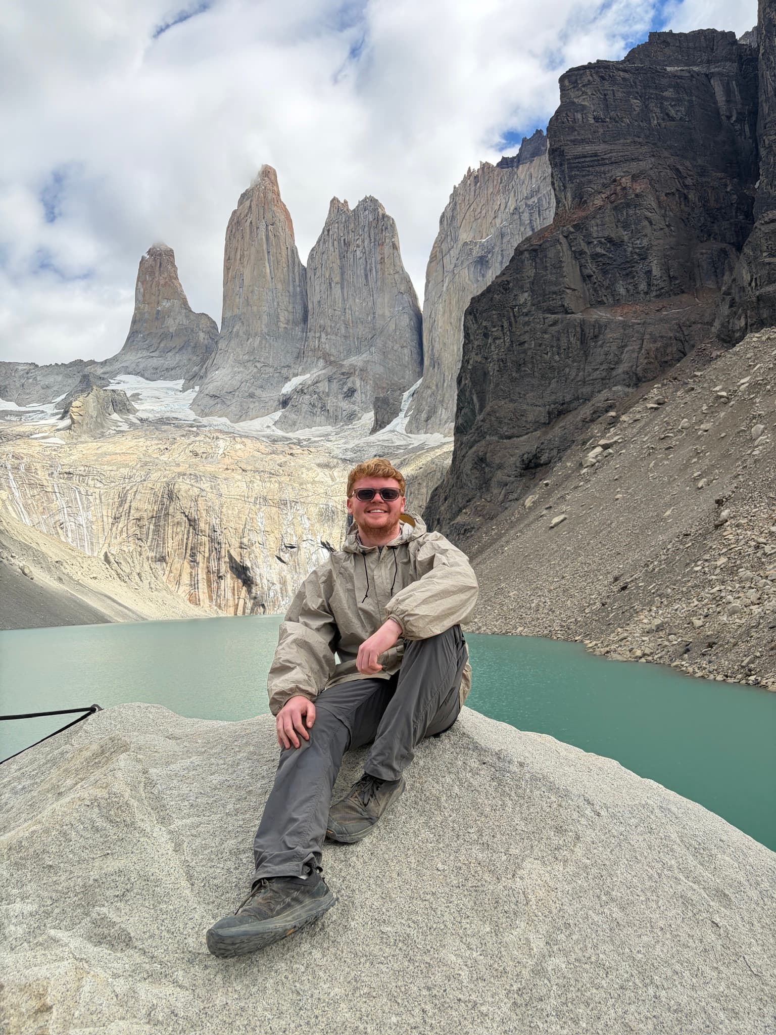 Sitting on a granite boulder before the granite towers of Torres del Paine